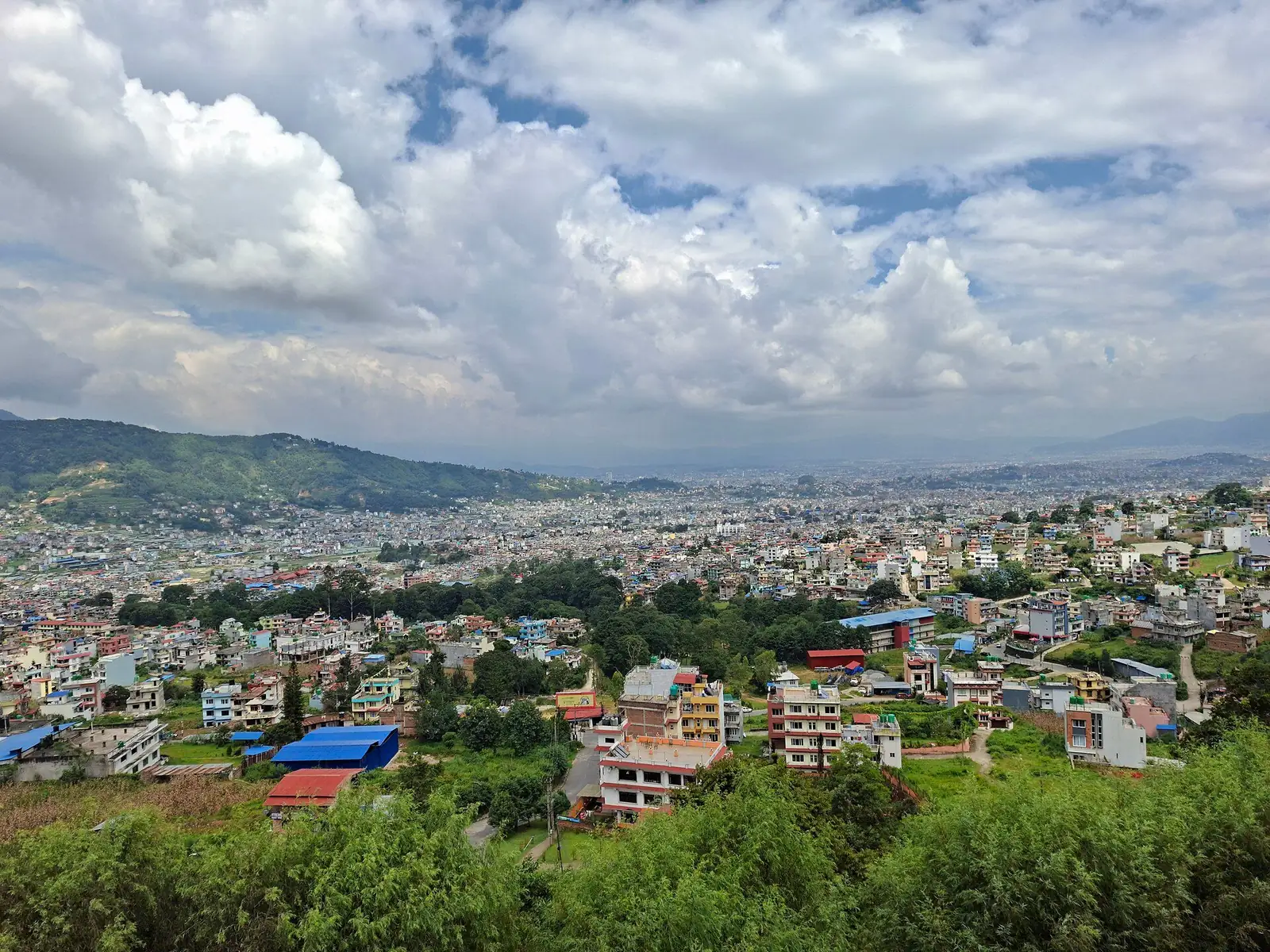 Panoramic view of the Kathmandu Valley from Chandragiri, with houses spread across the valley floor